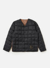 The TAION x Universal Works Reversible Black Military Line Liner Jacket is displayed on a white background. The jacket is black with a brown and tan checkered pattern visible on the inside.