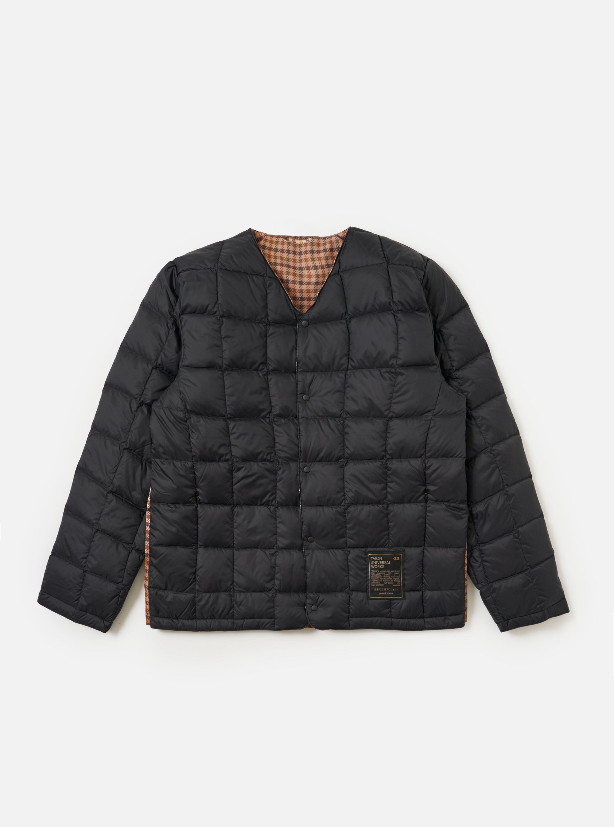 The TAION x Universal Works Reversible Black Military Line Liner Jacket is displayed on a white background. The jacket is black with a brown and tan checkered pattern visible on the inside.