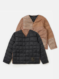 The TAION x Universal Works Reversible Black Military Line Liner Jacket. One side is black quilted nylon, the other is brown and tan houndstooth. Shown on a white background.
