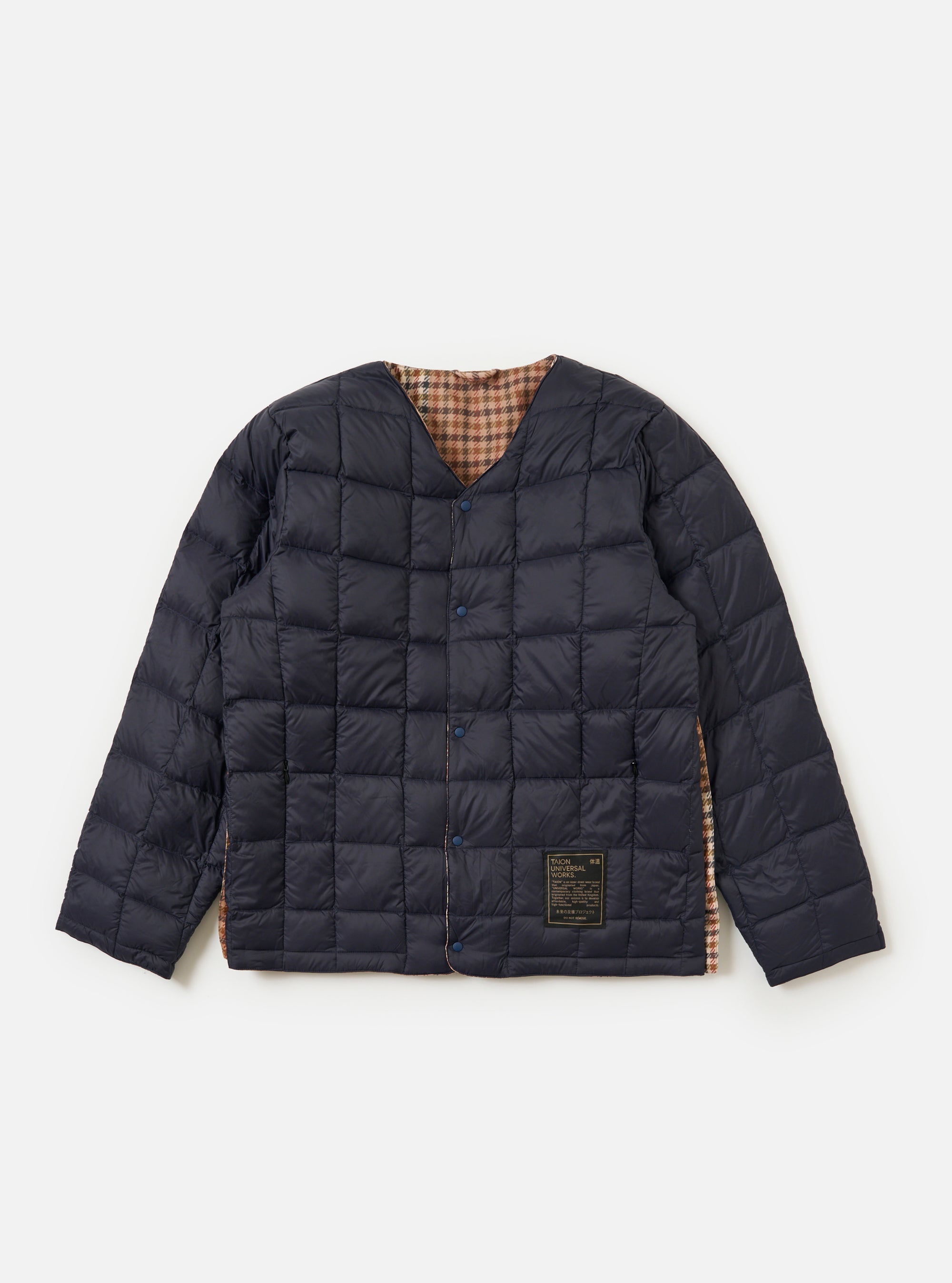 The TAION x Universal Works Reversible Dark Navy Military Line Liner Jacket is laid flat on a white background. It's reversible, with a brown houndstooth pattern visible on the inside.