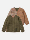 The TAION x Universal Works Reversible Dark Olive Military Line Liner Jacket. One side is dark olive, the other is brown and tan houndstooth. Shot on a white background.
