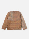 The TAION x Universal Works Reversible Dark Olive Military Line Liner Jacket in brown plaid on a white background. The jacket is reversible and made of a quilted material.