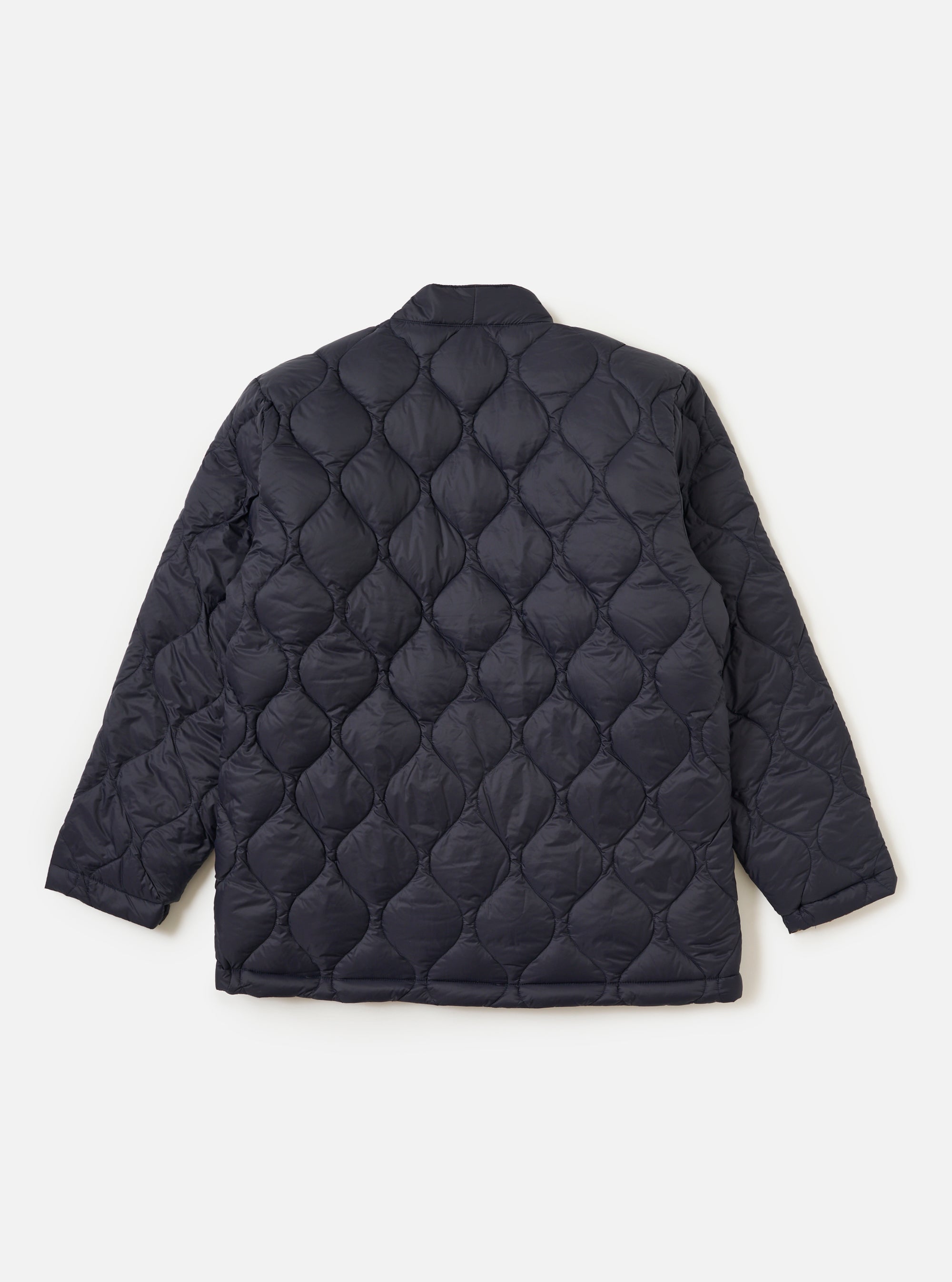 Close-up of the TAION x Universal Works Reversible Dark Navy Military Line Kyoto Work Jacket. Quilted texture, dark navy color. Shot against a white background.