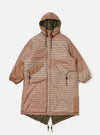 Flat lay of the TAION x Universal Works Reversible Dark Olive Military Line Parka. It features a brown plaid pattern and dark olive lining, displayed on a white background.