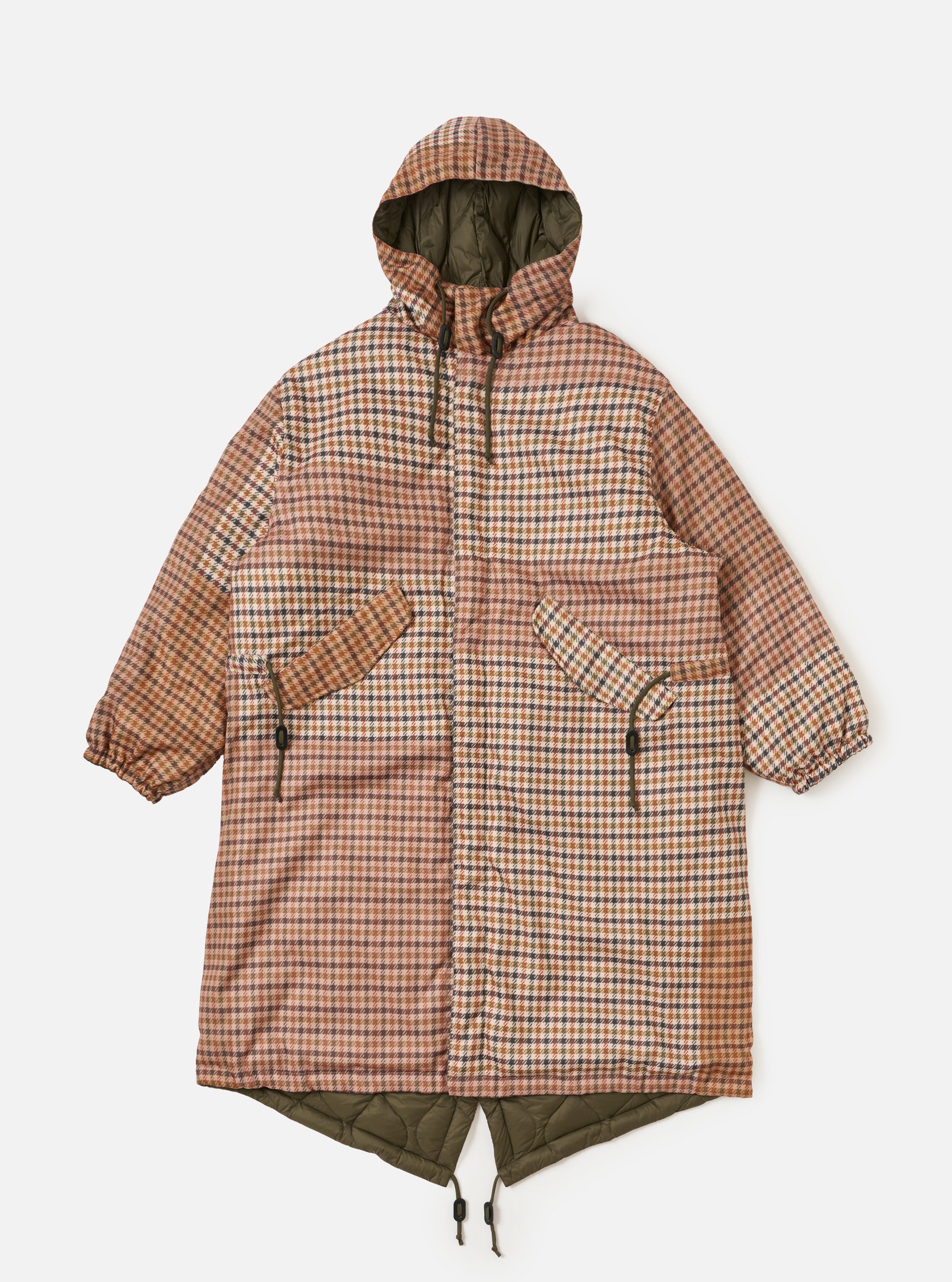 Flat lay of the TAION x Universal Works Reversible Dark Olive Military Line Parka. It features a brown plaid pattern and dark olive lining, displayed on a white background.