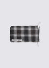 A. SOCIETY x Universal Works Honey Stanley Sunglasses pouch. Plaid fabric with drawstring on a white background. 
