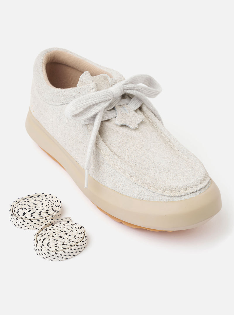 The Wander etc. FD/08 in Papier/Gum Suede/Leather is shown from a rear three-quarter angle as a flat lay against a white background. The image highlights the off-white hairy suede upper, fat cream laces, and the chunky gum rubber outsole. Small black branding is visible on the heel.