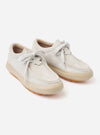 The Wander etc. FD/08 in Papier/Gum Suede/Leather is shown from a rear three-quarter angle as a flat lay against a plain white background. The image highlights the hairy suede upper in an ecru papier color, the chunky gum rubber outsole, and the branded black heel tab. Fat black laces are visible, and
