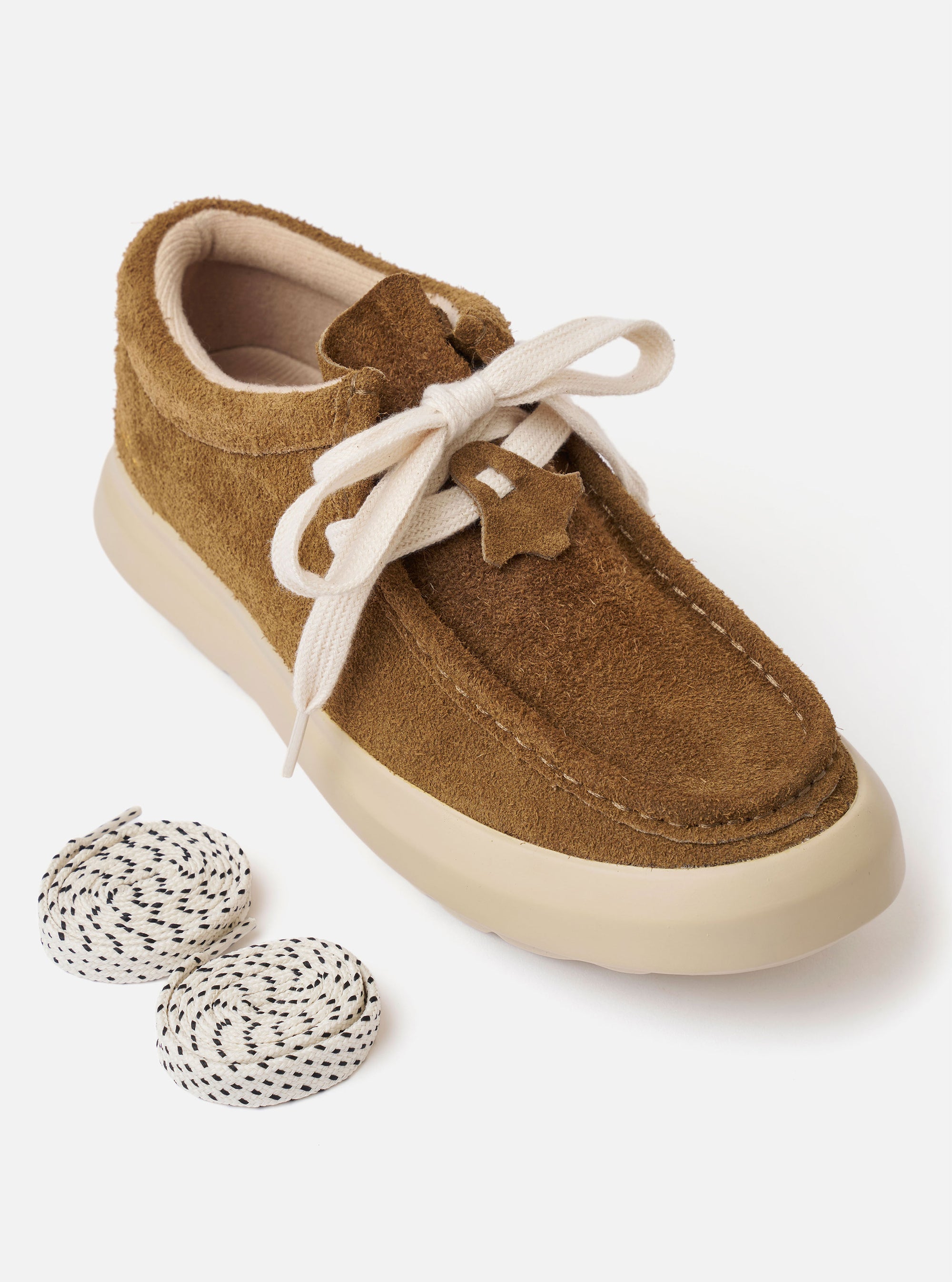 The Wander etc. FD/08 in Tobacco/Off White Suede/Leather is shown from a side angle as a flat lay against a plain white background. The shoe features a low-cut silhouette with a hairy tobacco-colored suede upper, thick off-white fat laces, and a chunky off-white phylon and rubber outsole.