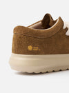 The Wander etc. FD/08 in Tobacco/Off White Suede/Leather is shown from a rear angle as a flat lay against a plain white background. The image highlights the tobacco-colored hairy suede heel counter, the chunky off-white phylon and rubber outsole, and the low-cut silhouette of the shoe.