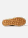 The Wander etc. FD/08 Low in Dune/Gum Hairy Suede is shown in a detail view as a flat lay against a plain white background. The image highlights the rear and side profile of the shoe, showcasing the textured dune-colored hairy suede upper, the chunky gum rubber outsole, and the subtle branding on the heel.