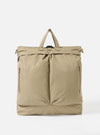 The F/CE.® Sage Green Recycled Twill 3-Way Helmet Bag is displayed on a white background. The bag is sage green and made of recycled twill. It has a top handle and two front pockets.