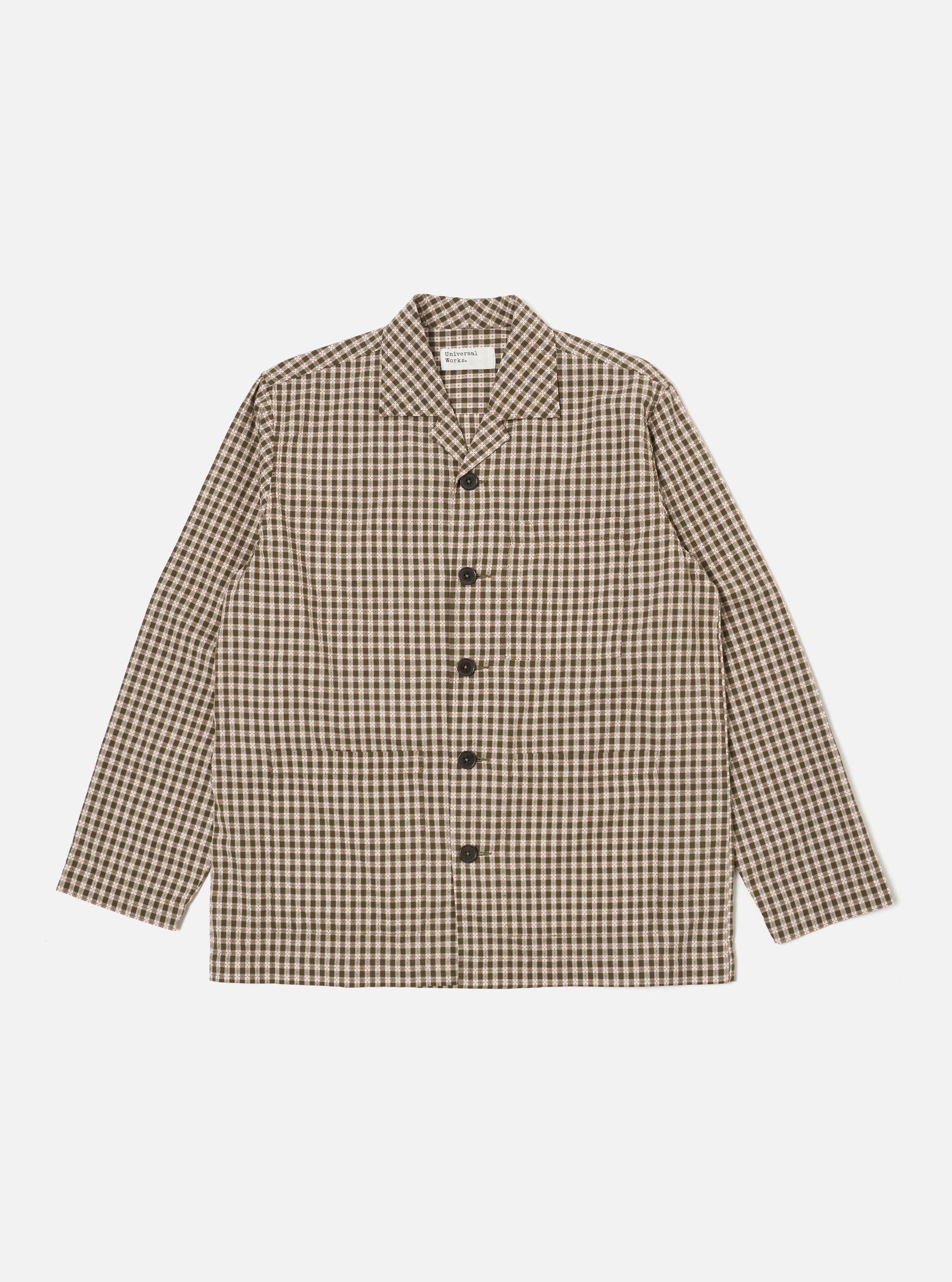 The Olive Dobby Check Cancun Jacket is laid flat on a white background. The jacket is a brown and olive green check pattern with long sleeves and button closure.