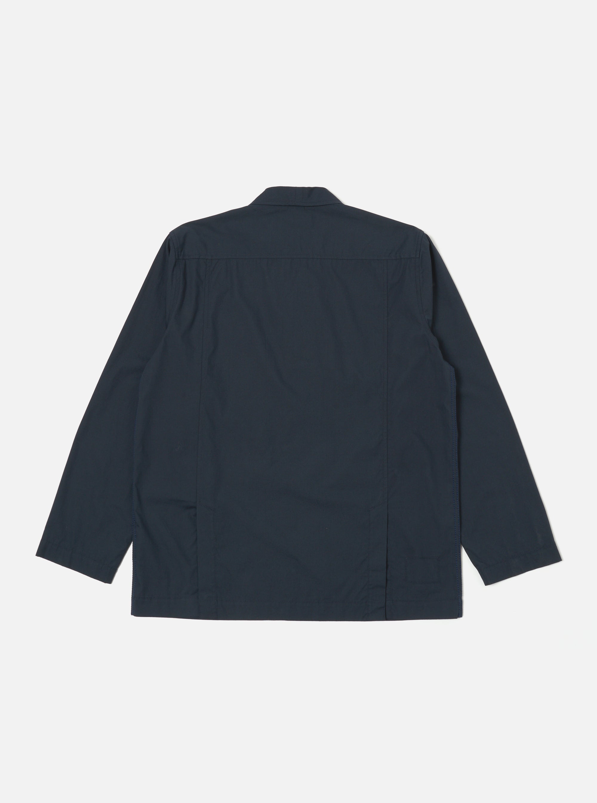 The back of a navy broadcloth Cancun Jacket on a white background. The jacket has short sleeves and a relaxed fit.
