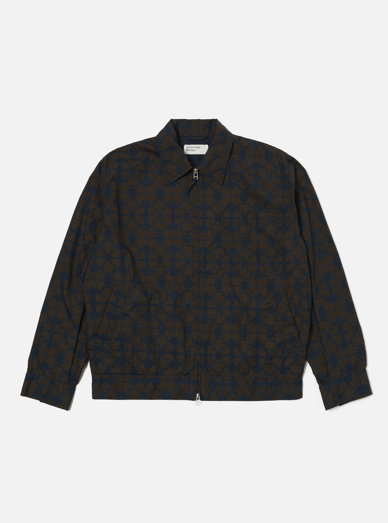 The Navy Mitla Print Cotton Rose Bowl Jacket on a white background. The jacket has a navy and brown print, a zip front, and a classic fit.
