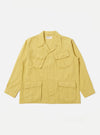 Flat lay of a Lemon Linen Slub Weave Jungle Jacket on a white background. The jacket is lemon-colored with a linen texture and features four front pockets.