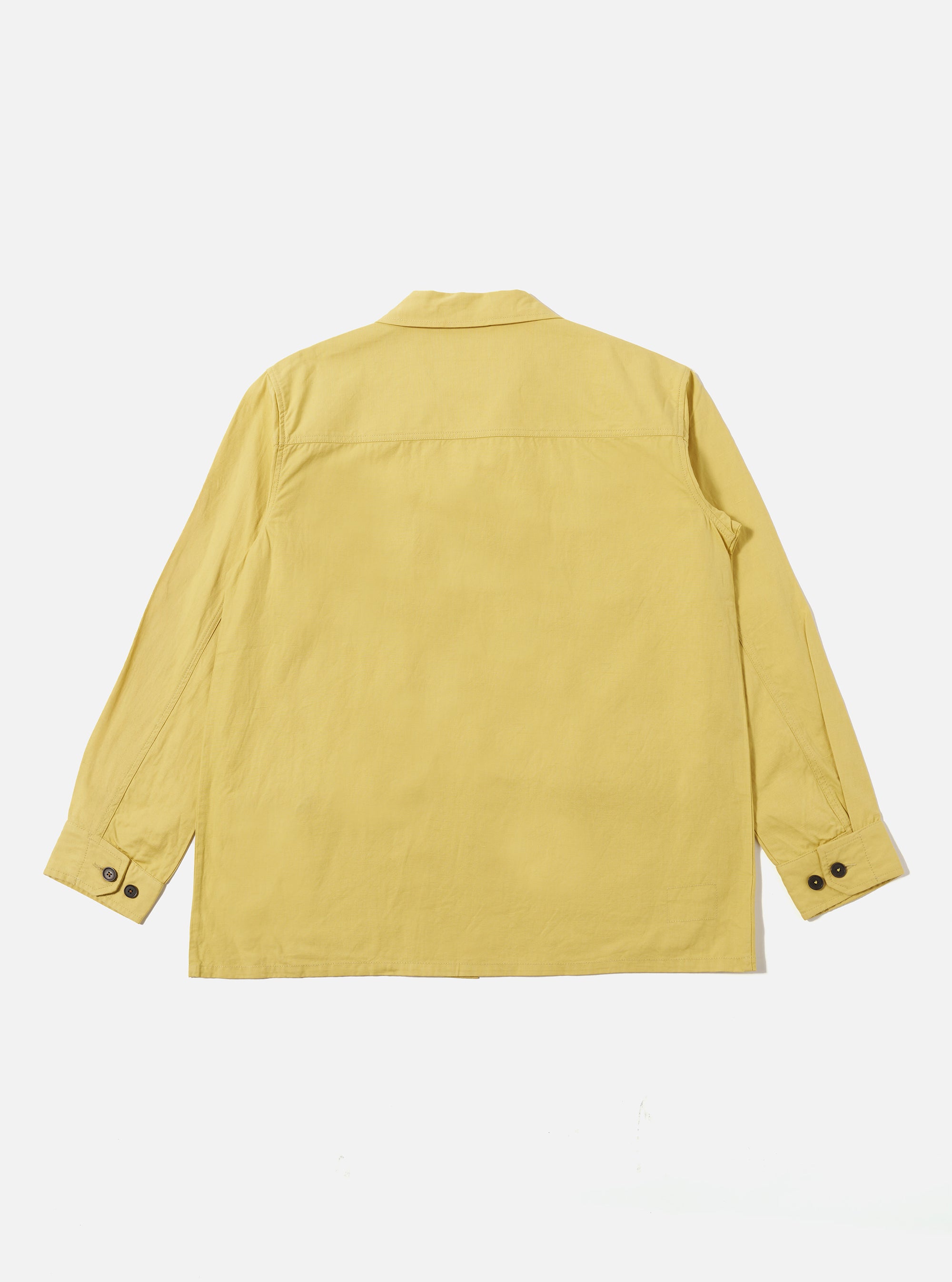Back view of the Lemon Linen Slub Weave Jungle Jacket on a white background. The jacket is a light yellow color and has long sleeves with buttoned cuffs.