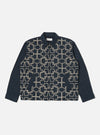 The Navy Mitla Broadcloth Club Jacket on a white background. The jacket is navy with a white geometric pattern on the front. The sleeves are plain navy.