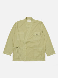 Pale green broadcloth Osaka Work Jacket on a white background. The jacket has a tie waist, pockets, and a relaxed fit.