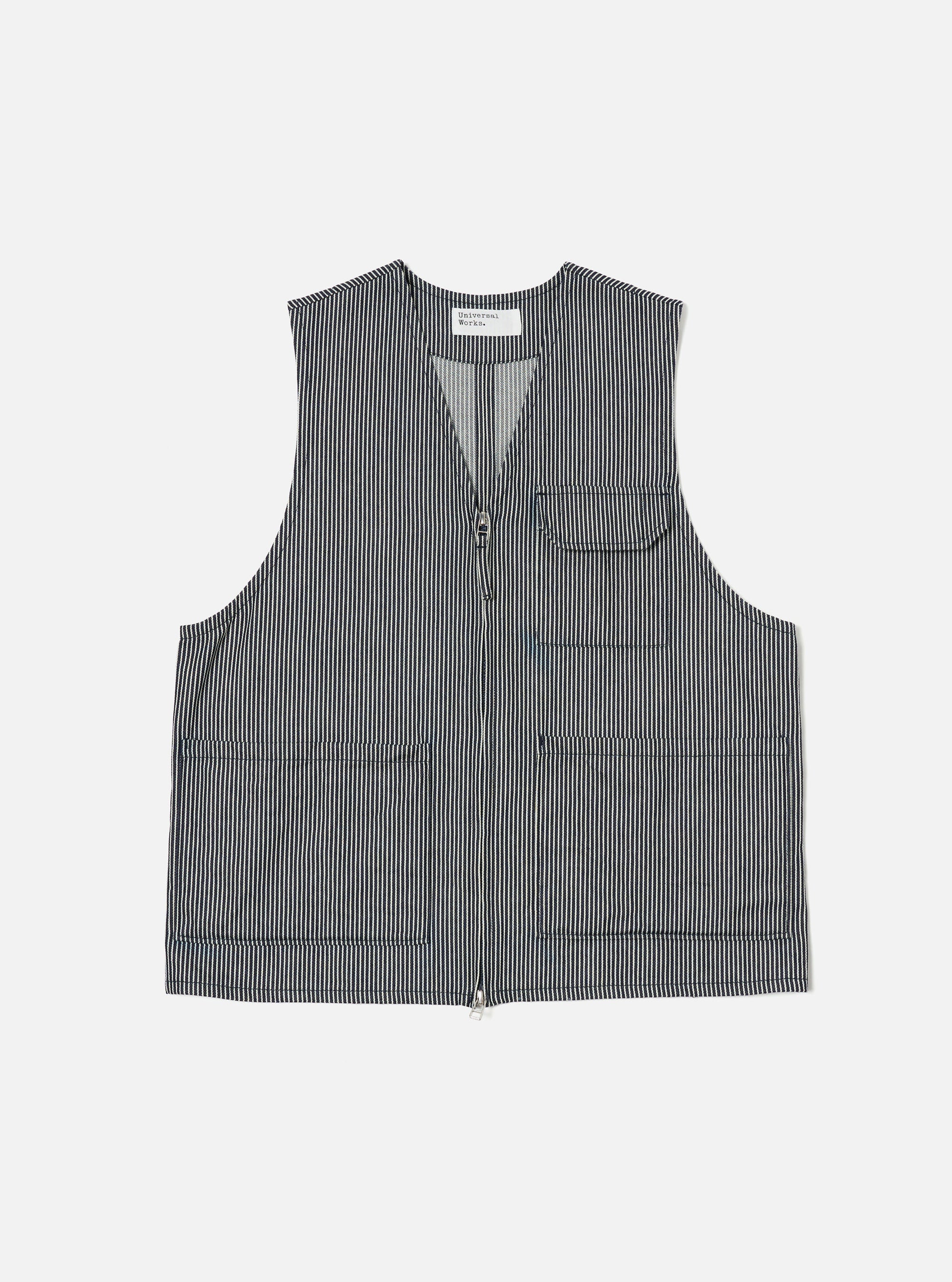 The Indigo Hickory Stripe Denim Marine Gilet, a blue and white striped vest with a zip front and pockets, is laid flat on a white background.