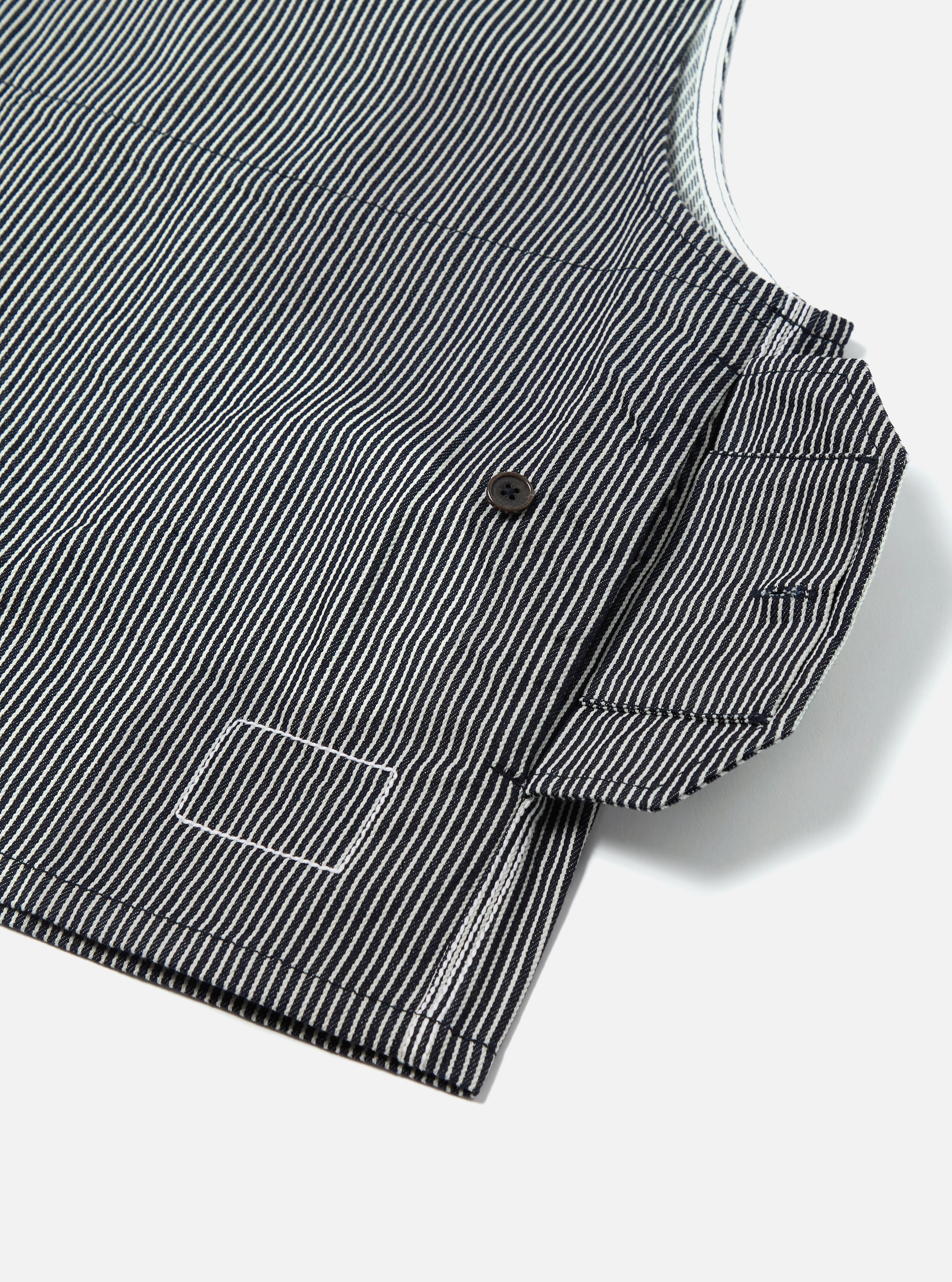 Close-up of the Indigo Hickory Stripe Denim Marine Gilet showing the striped denim fabric, button detail, and pocket on a white background.