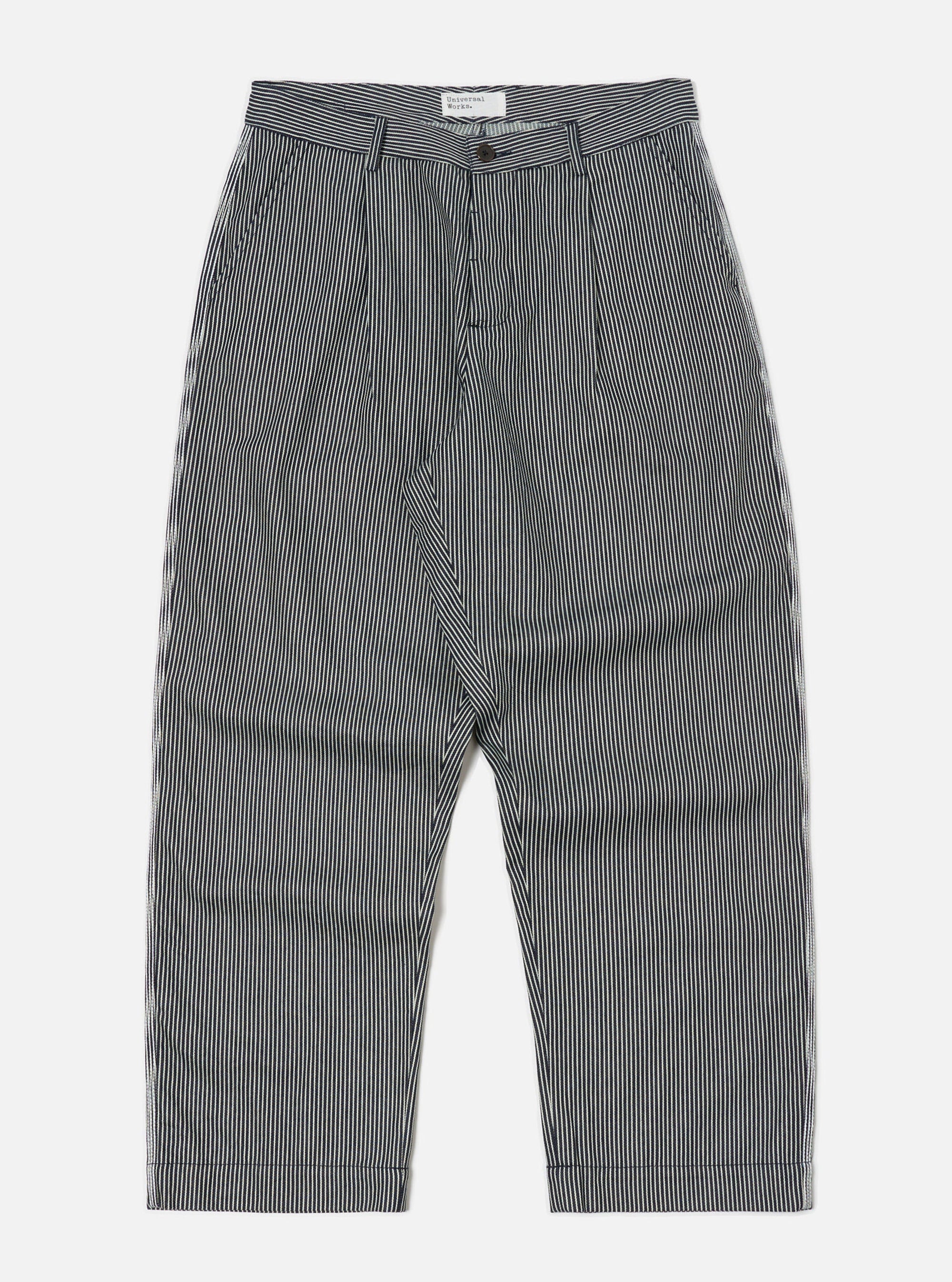 The Indigo Hickory Stripe Denim Duke Pant on a white background. These wide-legged pants feature a blue and white vertical stripe pattern.