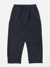 The Navy Linen Slub Weave Oxford Pant, in navy linen, is laid flat on a white background. The pants have a relaxed fit and an elastic waistband.