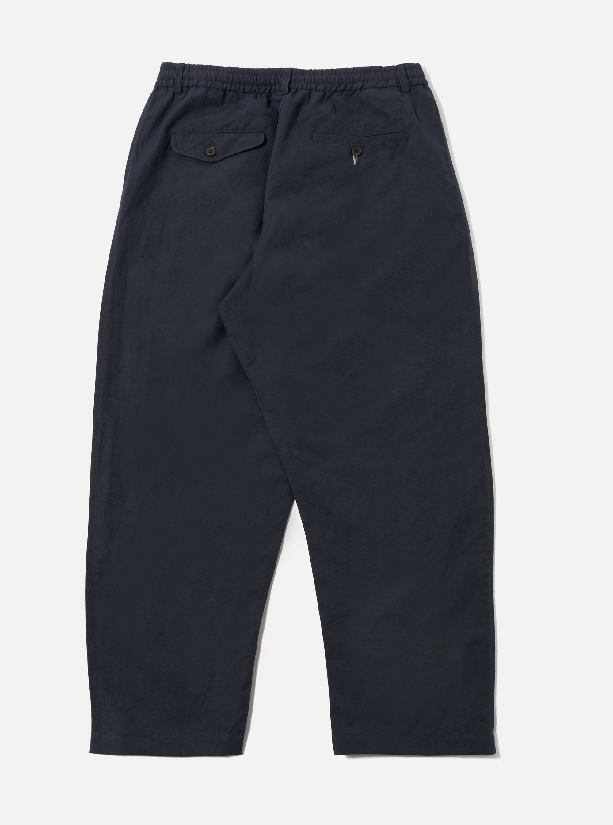 Back view of the Navy Linen Slub Weave Oxford Pant on a white background. The pants have a relaxed fit and visible slub texture.