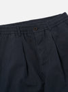 Close-up of the Navy Linen Slub Weave Oxford Pant on a white background. Shows the navy color, linen texture, button closure, and pleated design.