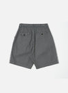 Back view of Indigo Hickory Stripe Denim Pleated Track Short on a white background. The denim shorts have a relaxed fit with an elastic waistband and back pockets.