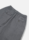 Close-up of Indigo Hickory Stripe Denim Pleated Track Short showing the striped denim material, pleated details, and back pockets on a clean white background.