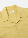 Close-up of the Lemon Linen Cotton Shirting Camp Shirt on a white background. The shirt is a light yellow color and has a camp collar.