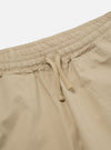 Close-up of the Sand Military Cotton Judo Pant. Shows the elastic waistband with drawstring. The sand-colored cotton is smooth. Shot on a white background.