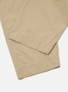 Close-up of the sand-colored Military Cotton Judo Pant on a white surface. The cotton fabric shows subtle texture and the relaxed fit is evident in the drape.