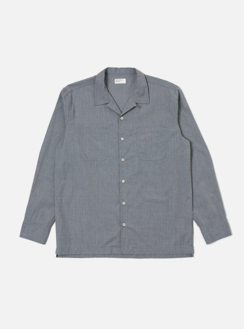 The Grey End On End Cotton Garage Shirt is laid flat on a white background. This long-sleeved shirt has a camp collar, two chest pockets, and a button-up front.