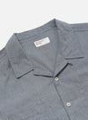 Close-up of the Grey End On End Cotton Garage Shirt on a white background. The shirt is made of a textured grey cotton and has a camp collar and two chest pockets.