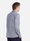 Profile of a model wearing a Grey End On End Cotton Garage Shirt. The light grey cotton shirt is displayed against a white background.