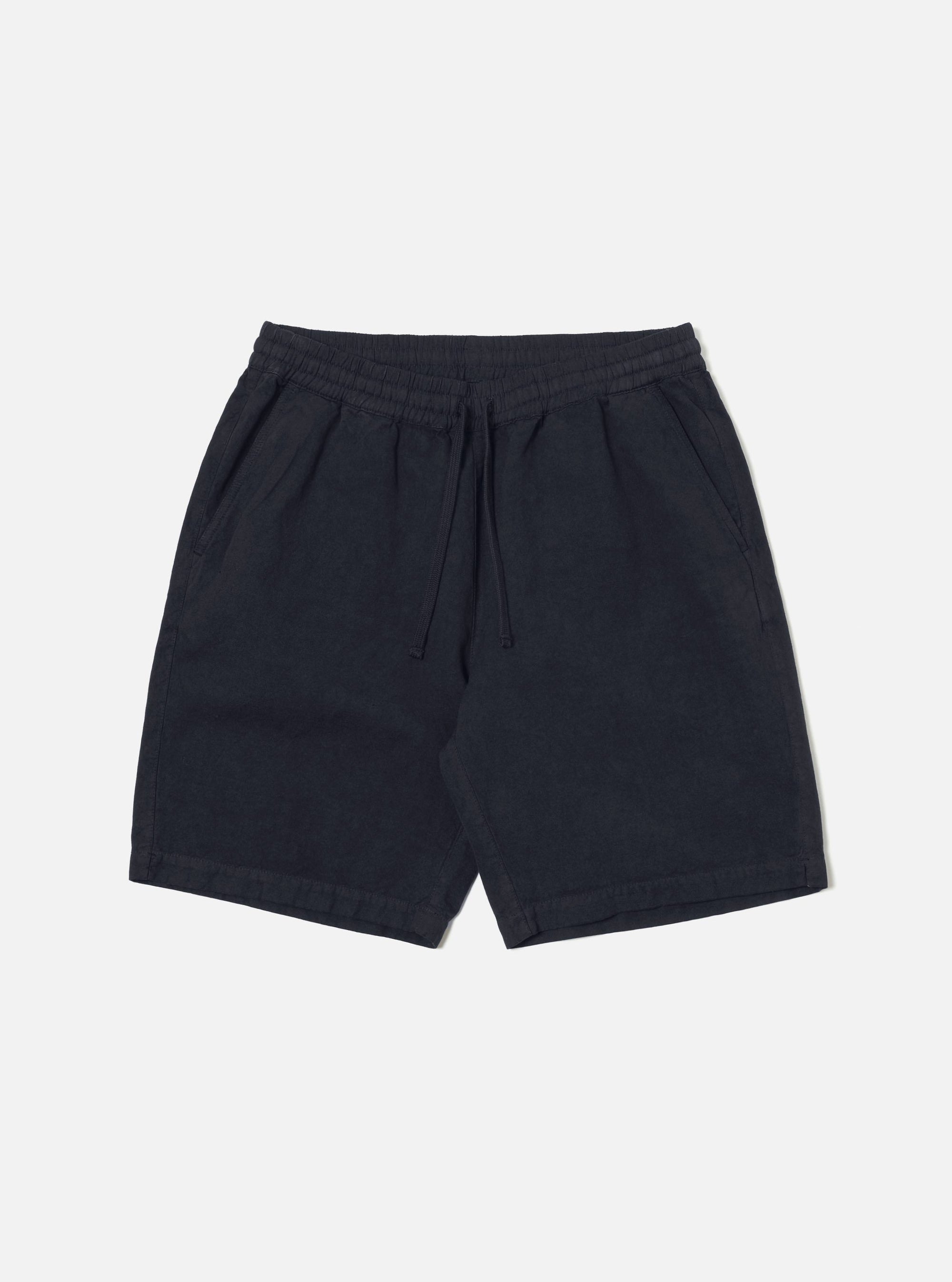 The Navy Linen Slub Weave Simple Short is displayed on a white background. These navy, linen shorts have a relaxed fit and drawstring waist.