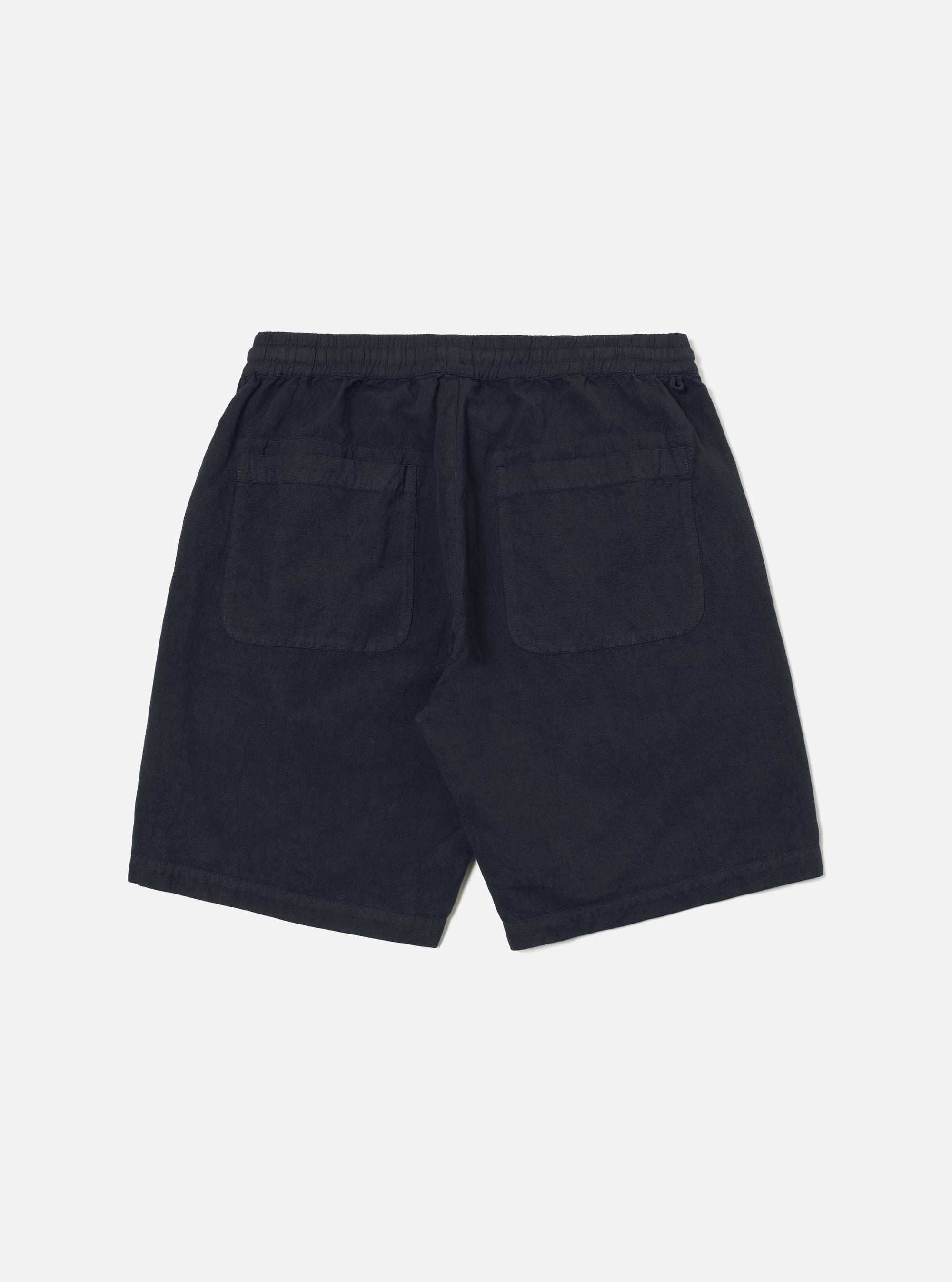 Back view of the Navy Linen Slub Weave Simple Short on a white background. The shorts have a relaxed fit and two back pockets.