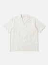The Ecru Deffe Self Stripe Minari Shirt in off-white, displayed on a white background. The short-sleeved shirt has a camp collar and a chest pocket.