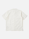 Back view of the Ecru Deffe Self Stripe Minari Shirt, an off-white short-sleeve shirt with a subtle stripe pattern, laid flat on a white background.