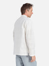 A man on a white background models the Ecru Deffe Self Stripe Smock Overshirt. The shirt is a light ecru color with subtle stripes and a relaxed fit.