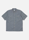 The Grey End On End Cotton Utility SS Shirt is laid flat on a white background. It's a short-sleeved, button-down shirt with two chest pockets and white contrast stitching.