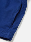 Close-up of the Work Blue Summer Cord Tech Overshirt showing the corduroy texture and a zippered pocket on a white background.