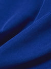 Close-up of the Work Blue Summer Cord Tech Overshirt fabric. The rich blue corduroy texture is highlighted with soft lighting, showing the material's fine ridges.