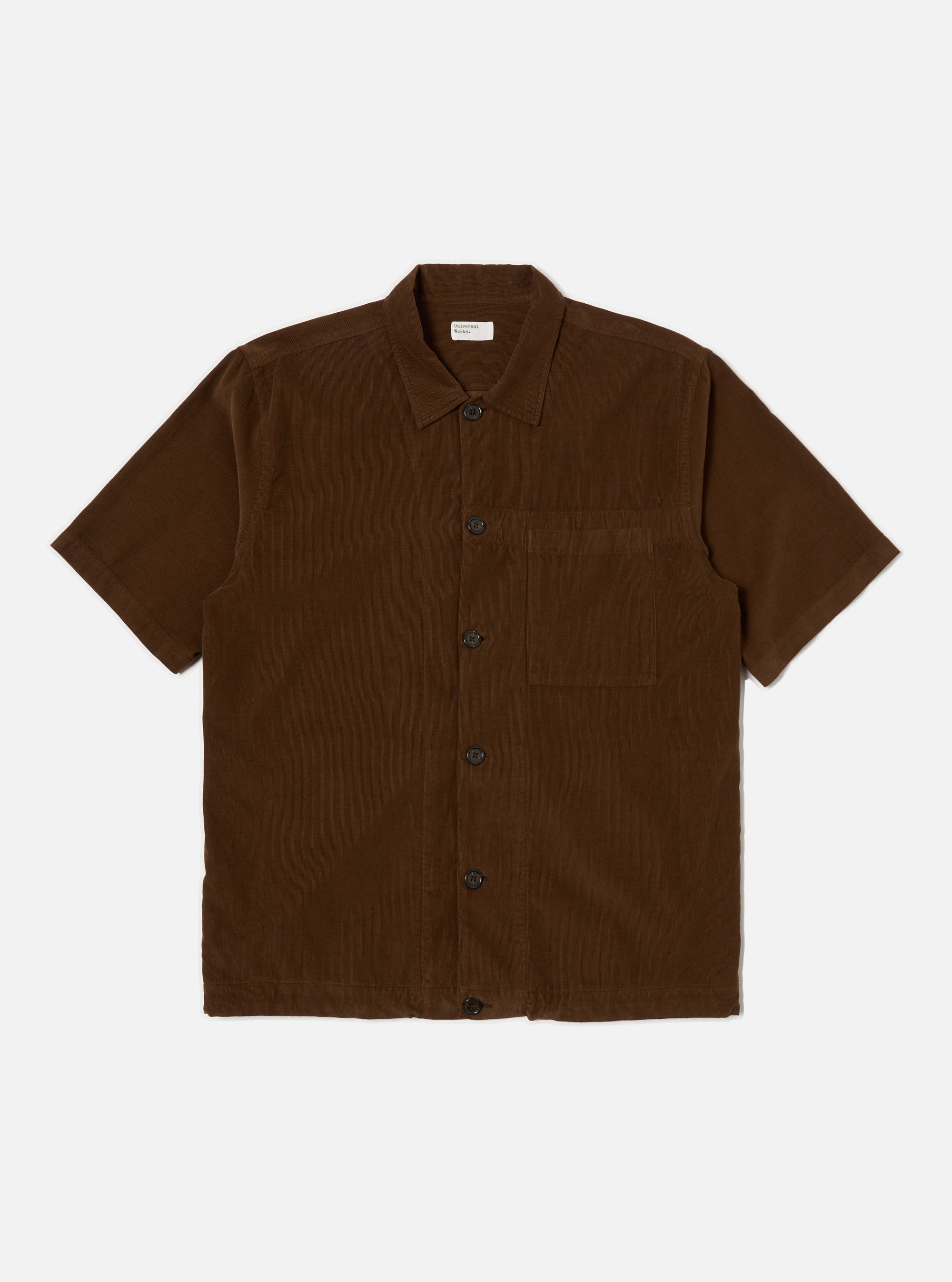 The Khaki Summer Cord Tech Overshirt in brown corduroy, laid flat on a white background. The short-sleeved shirt has a button-up front and a chest pocket.