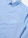 Close-up of the Blue Vila Stripes Patched Shirt on a white surface. The shirt features light blue and white stripes with a patched pocket.