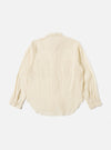 The Ecru Acapulco Weave Work Shirt, shown on a white background. The shirt is a light ecru color with long sleeves and a button-down front. The weave is visible and textured.