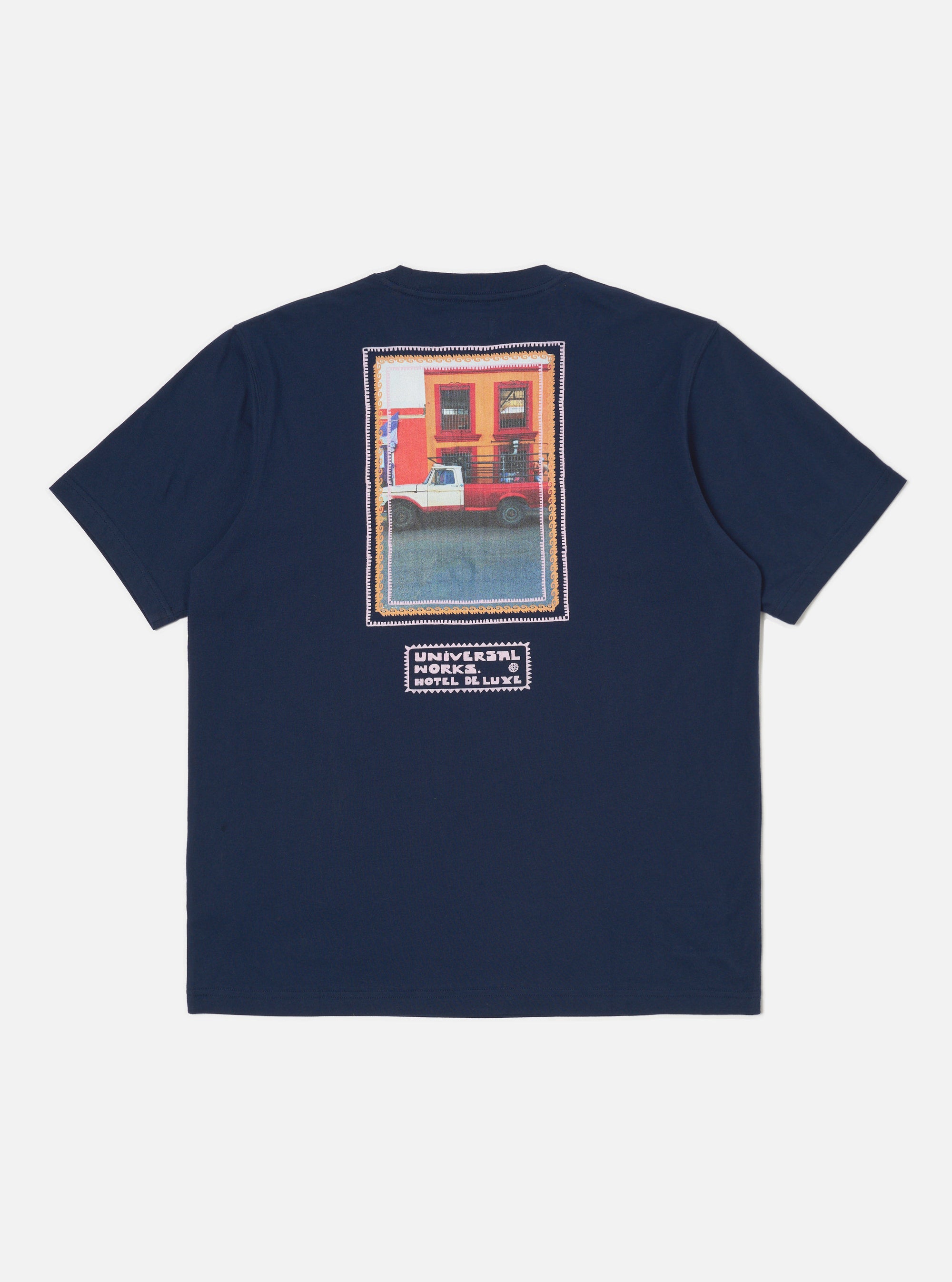 Navy/Pink Single Jersey Pickup Print Tee on a white background. The tee has a graphic of a pink and white truck on the back.