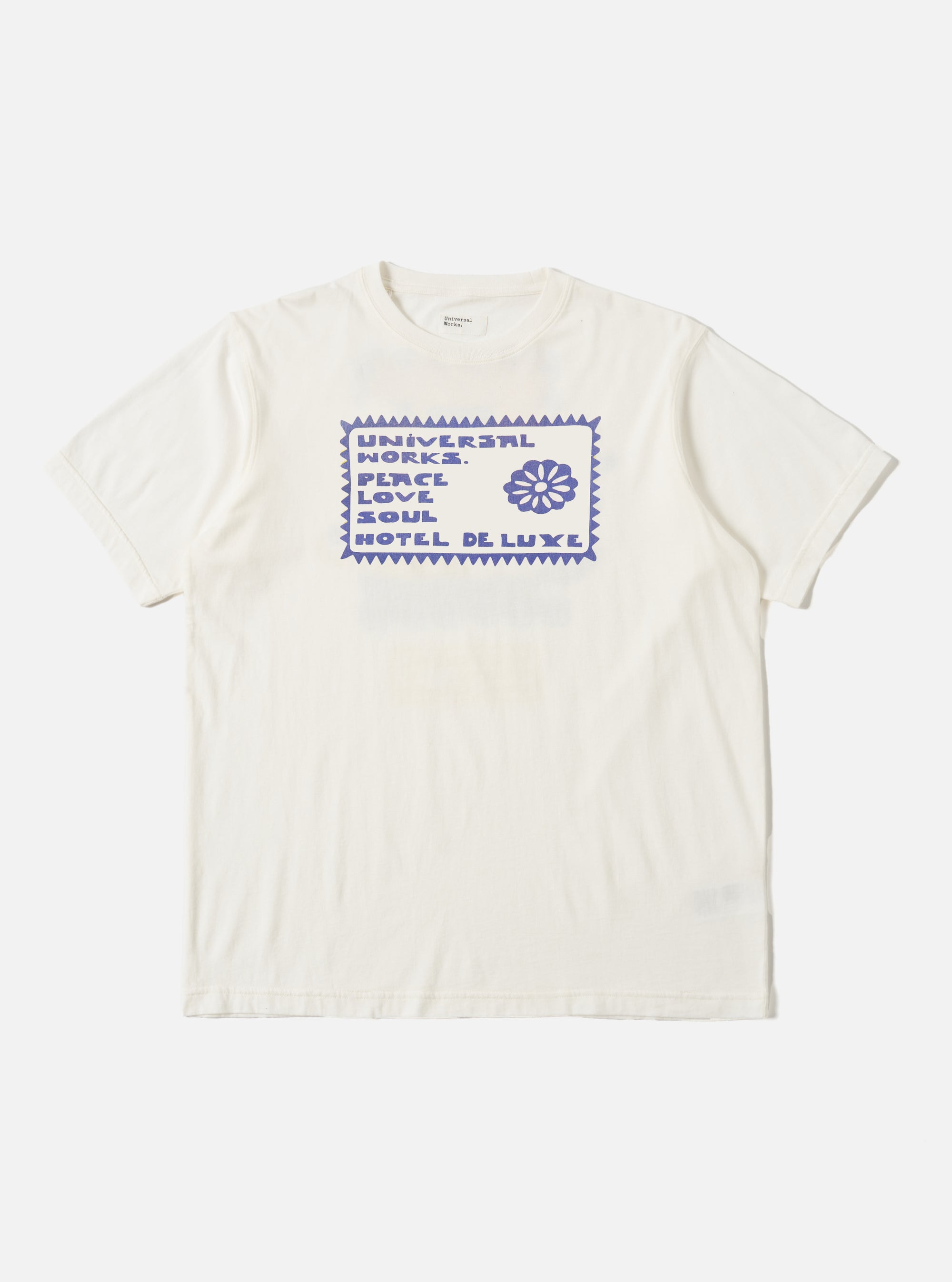 Ecru/Yellow Single Jersey Pickup Print Tee on a white background. The tee has a blue graphic print. 